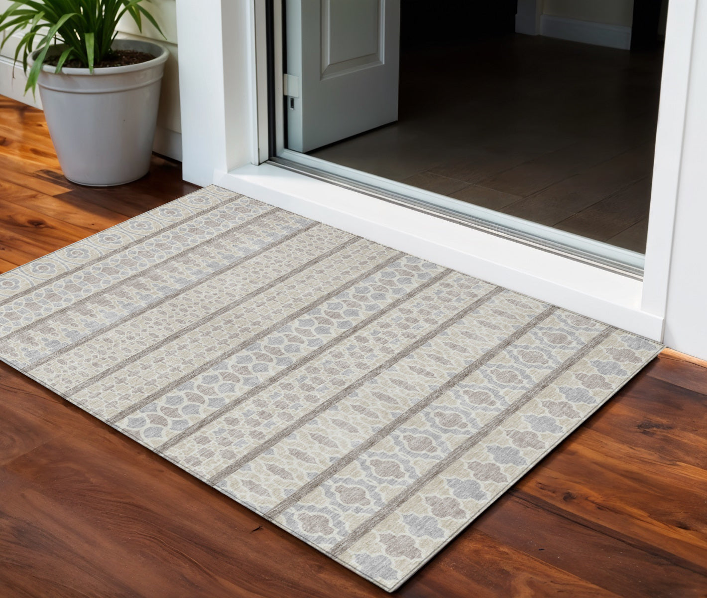 3' X 5' Ivory Beige And Taupe Quatrefoil Washable Indoor Outdoor Area Rug